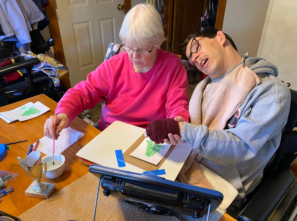 Barb and Ryan drawing Christmas cards